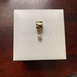 Authentic Pandora 14k Gold pearl charm.